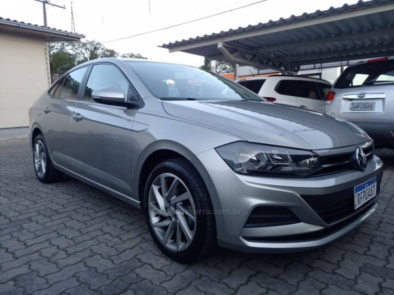 VOLKSWAGEN - VIRTUS - 2020/2021 - Dourada - R$ 76.000,00